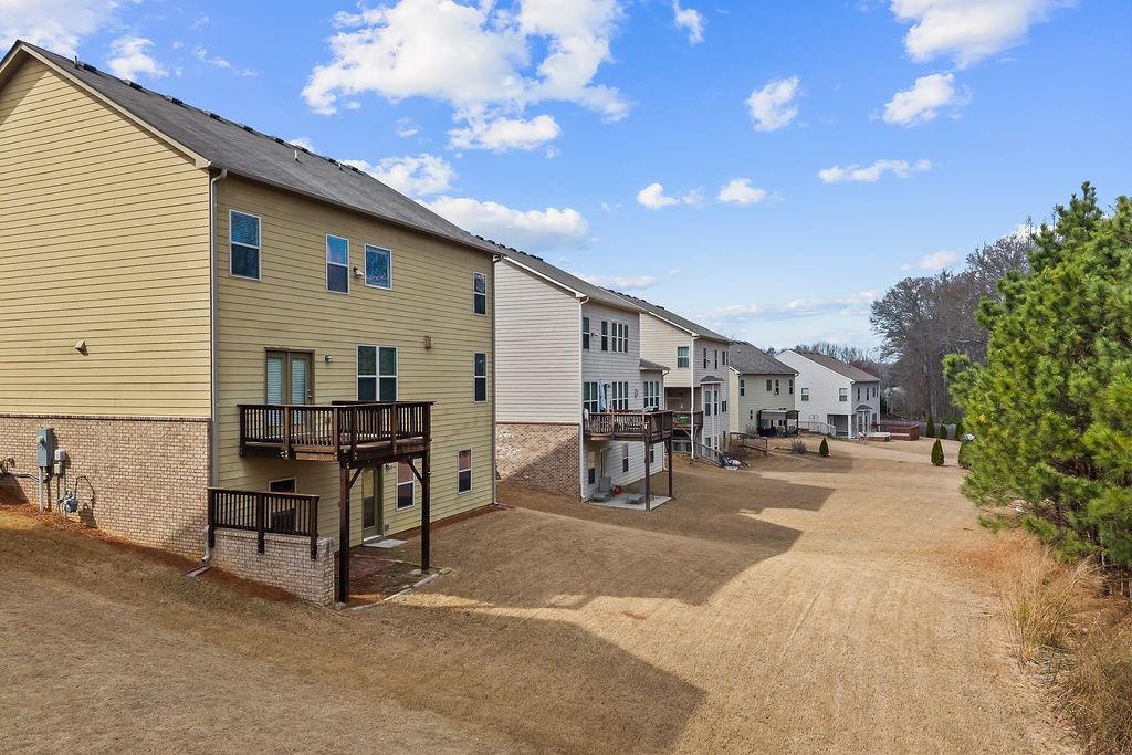 2415 Matlin Way Buford, GA 30519 - Photo 55 of 66 a view of a house with a patio