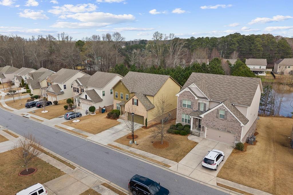 2415 Matlin Way Buford, GA 30519 - Photo 60 of 66 a view of a house with a street
