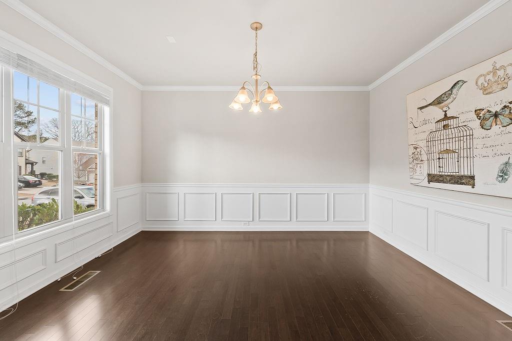 2415 Matlin Way Buford, GA 30519 - Photo 6 of 66 a view of wooden floor and windows in a room