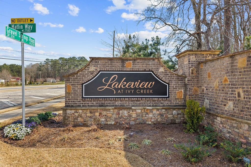 2415 Matlin Way Buford, GA 30519 - Photo 66 of 66 a sign that is on the side of a road