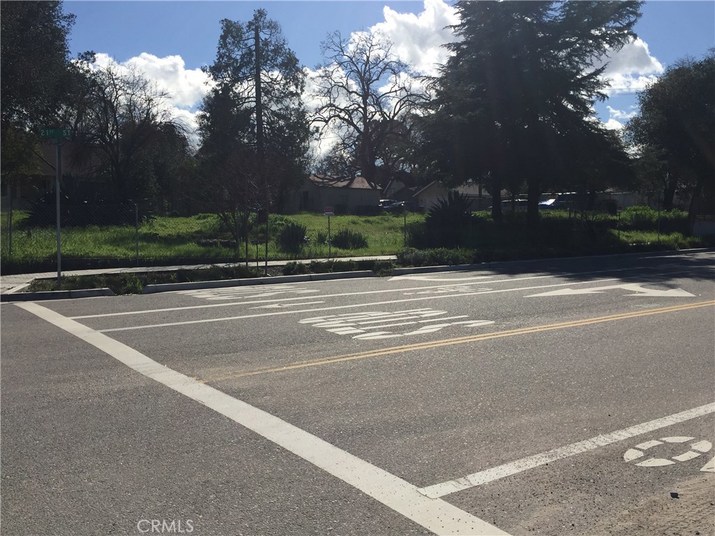 2045 Spring Street Paso Robles, CA 93446 - Photo 1 of 1 a view of a house with large trees and plants