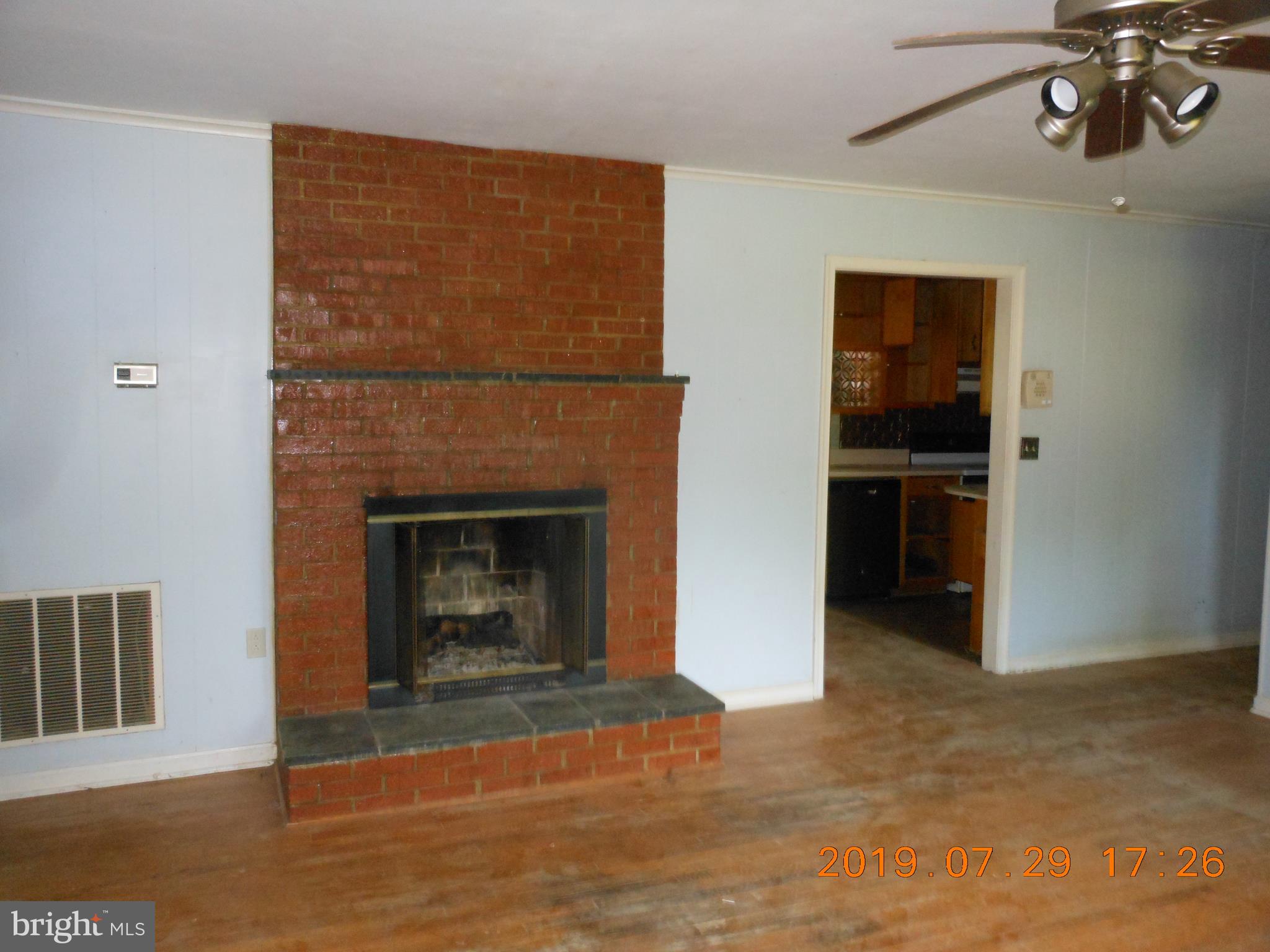 15604 Mountain Track Road Orange, VA 22960 - Photo 3 of 10 Living room with fireplace