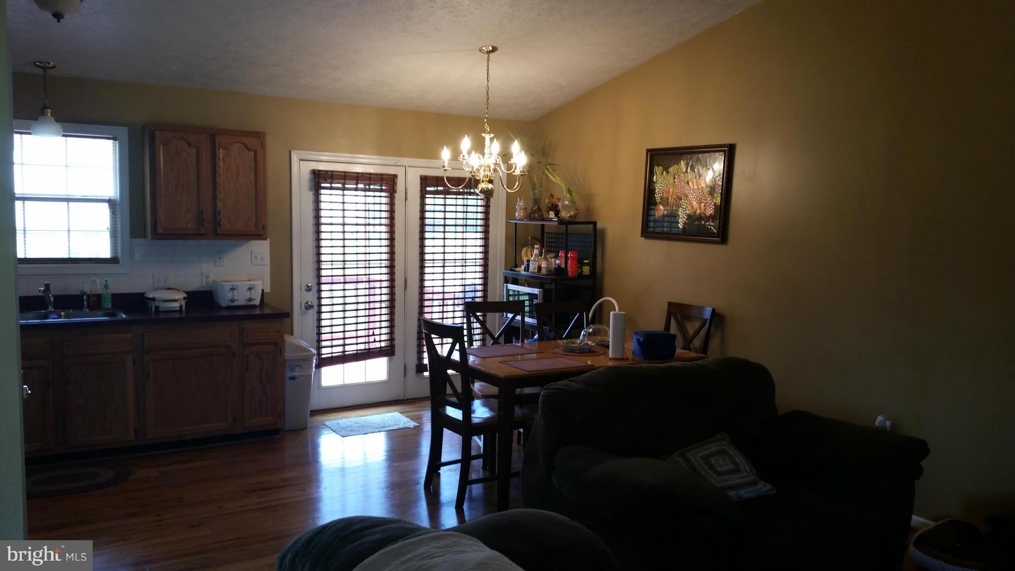 203 Preston Ranson, WV 25438 - Photo 5 of 12 a dining room with furniture and window