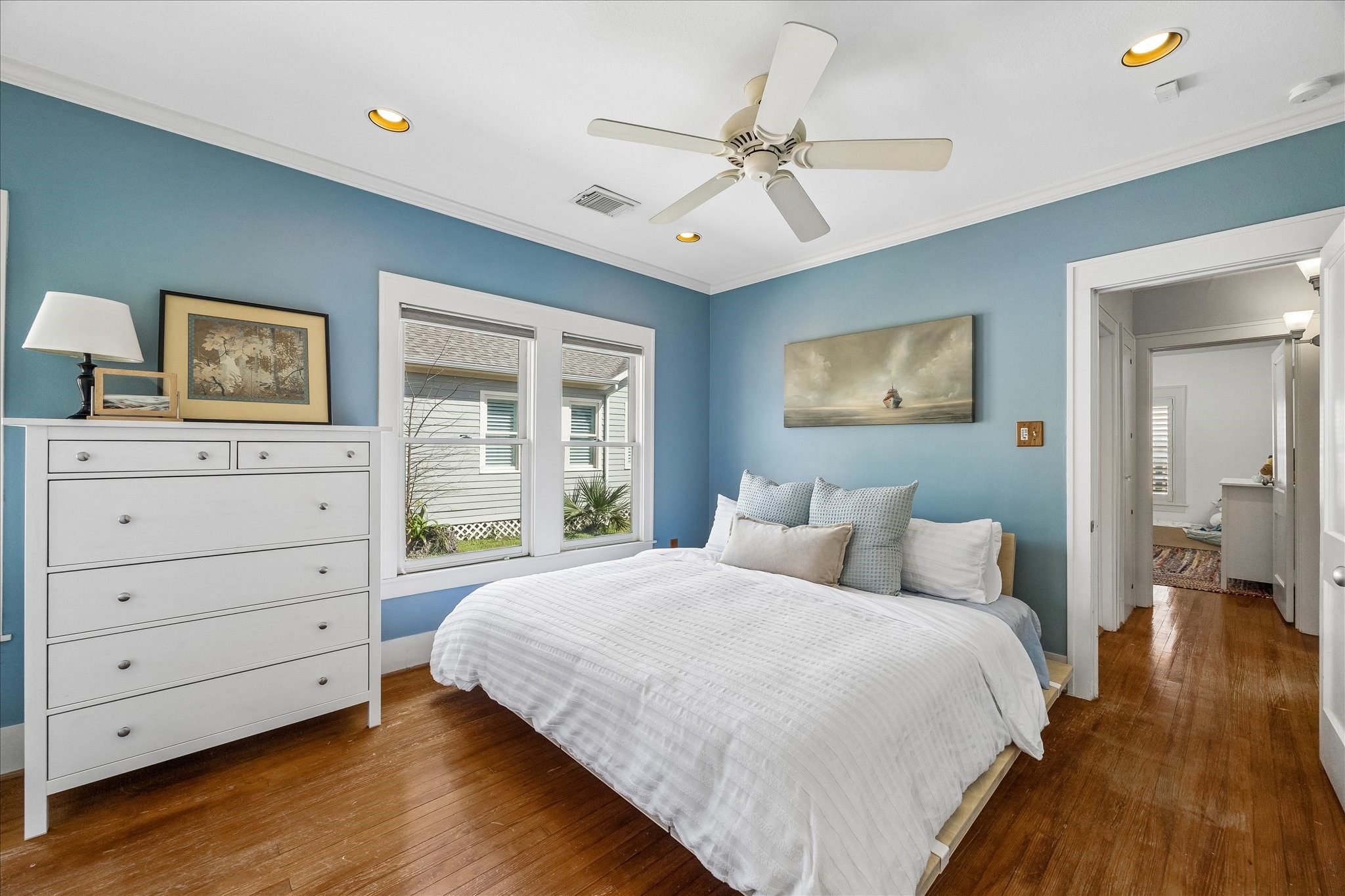 919 Key Street Houston, TX 77009 - Photo 18 of 39 A spacious primary suite thoughtfully positioned at the rear of the home, offering a heightened sense of privacy and quiet retreat.
