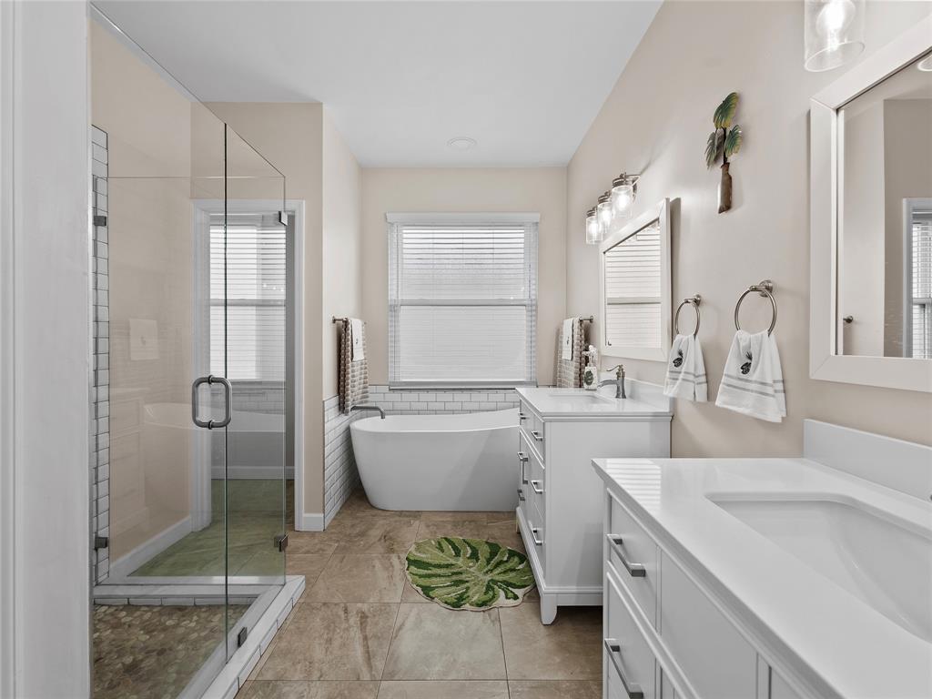 4480 23rd Way Vero Beach, FL 32966 - Photo 18 of 29 a bathroom with a sink toilet and shower