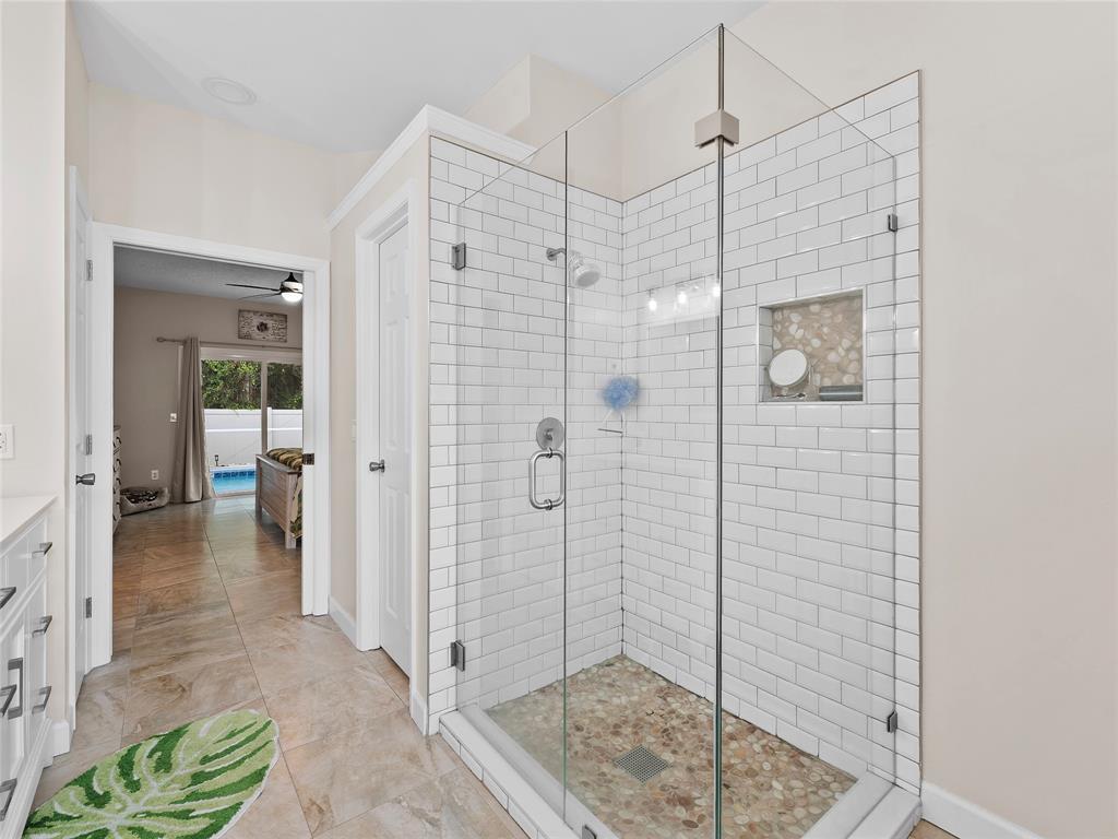 4480 23rd Way Vero Beach, FL 32966 - Photo 20 of 29 a bathroom with a shower and a sink