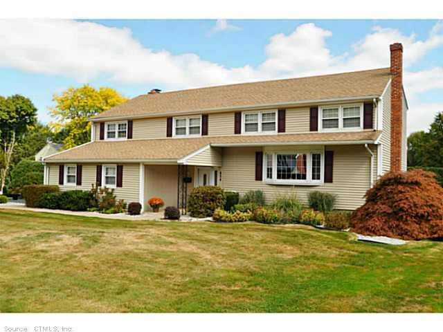 Exterior Front. Professionally landscaped