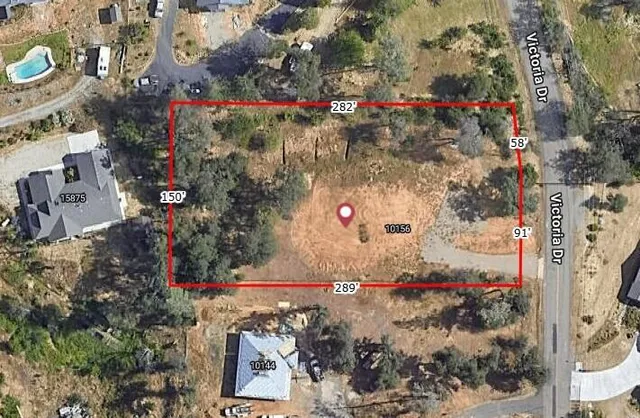 a view of a yard with an outdoor space