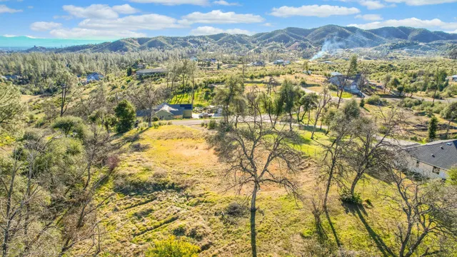 a view of a city with mountains in the background