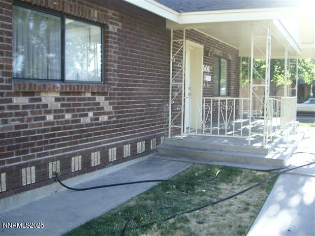 506 East Taylor Street Reno, NV 89502 - Photo 11 of 12 a view of front door of house with outdoor space