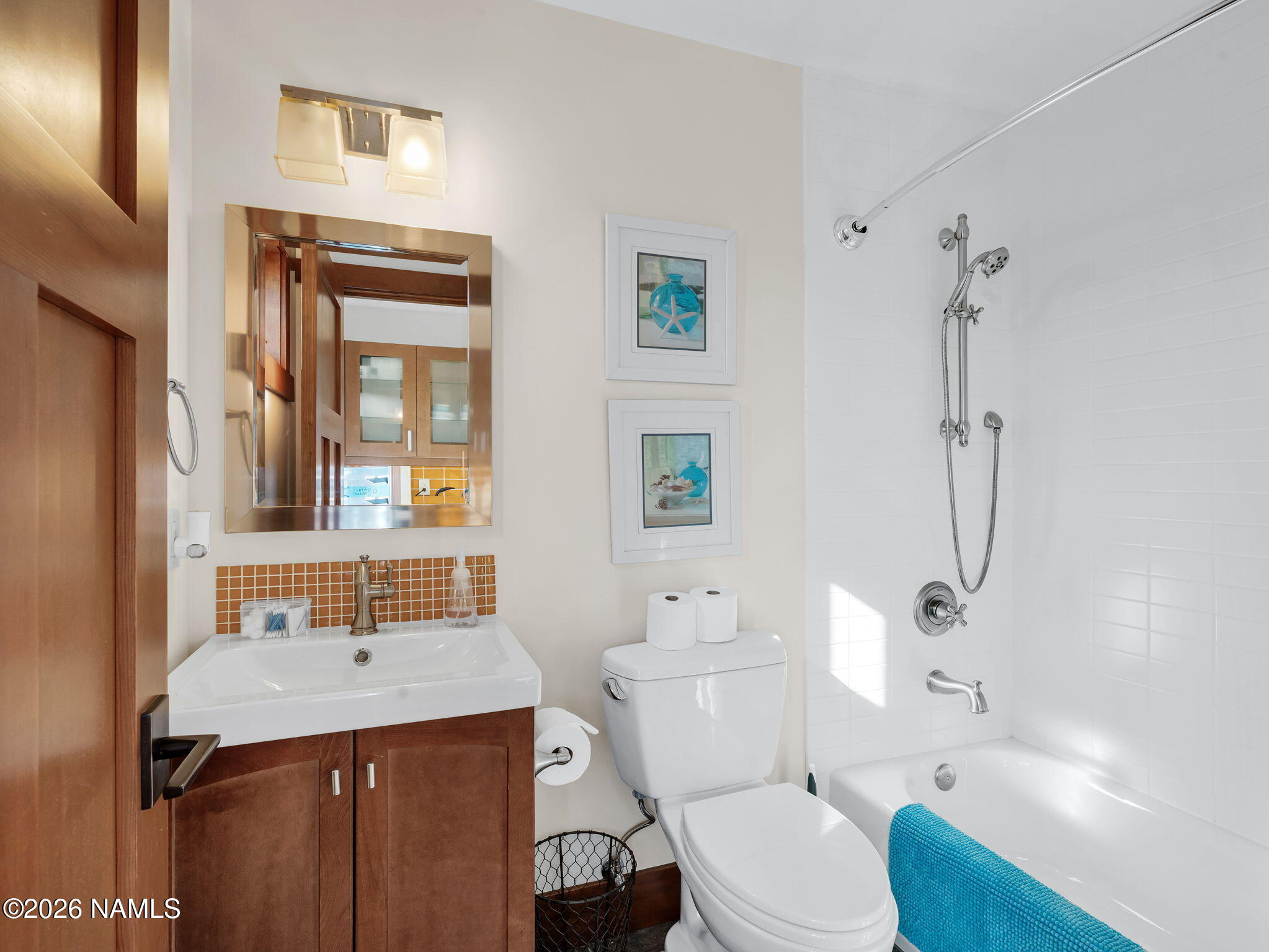 15739 Rabbit Brush Road Parks, AZ 86018 - Photo 53 of 67 a bathroom with a sink a toilet and shower
