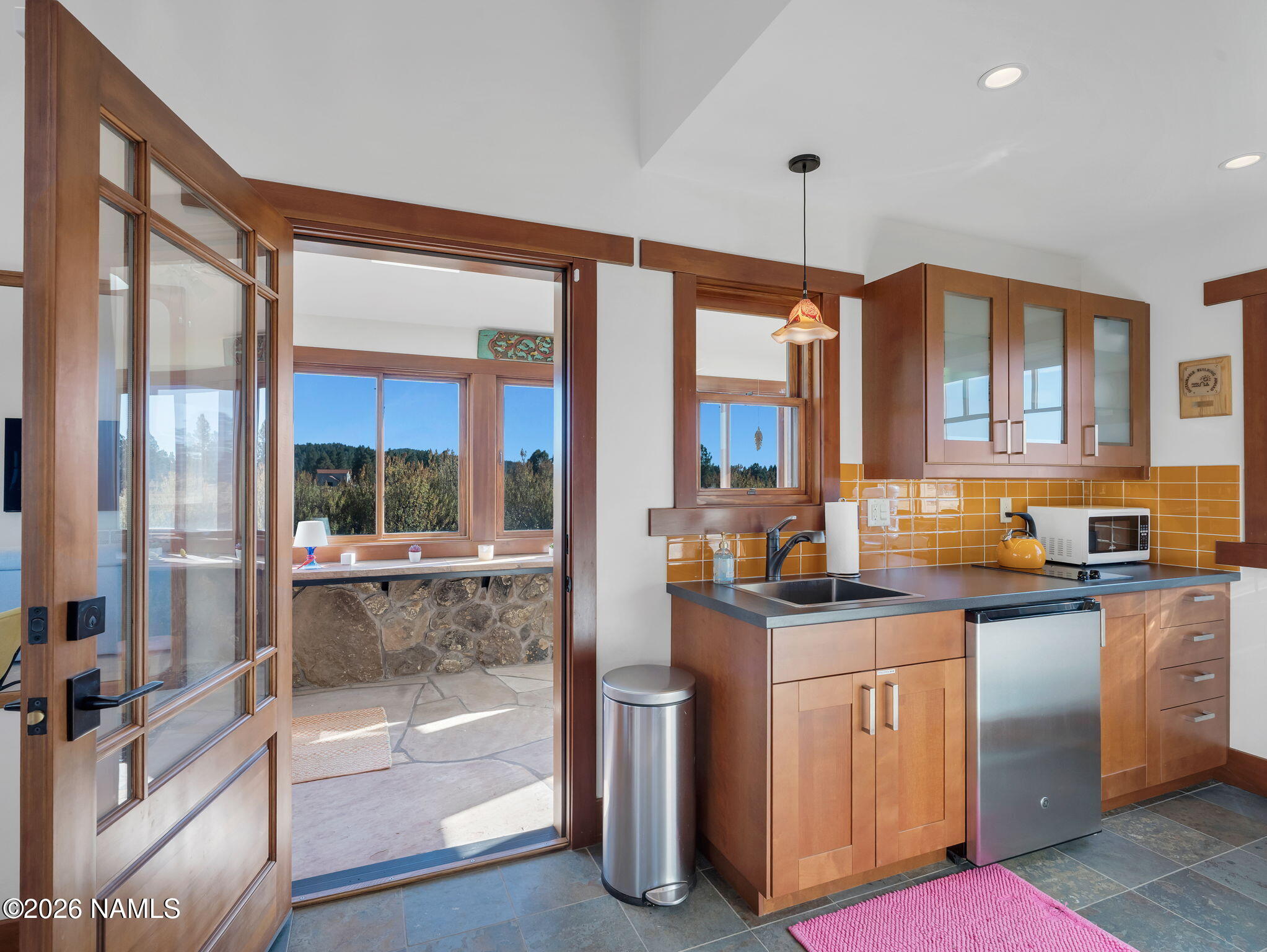 15739 Rabbit Brush Road Parks, AZ 86018 - Photo 54 of 67 a kitchen with stainless steel appliances granite countertop a sink a stove and a refrigerator