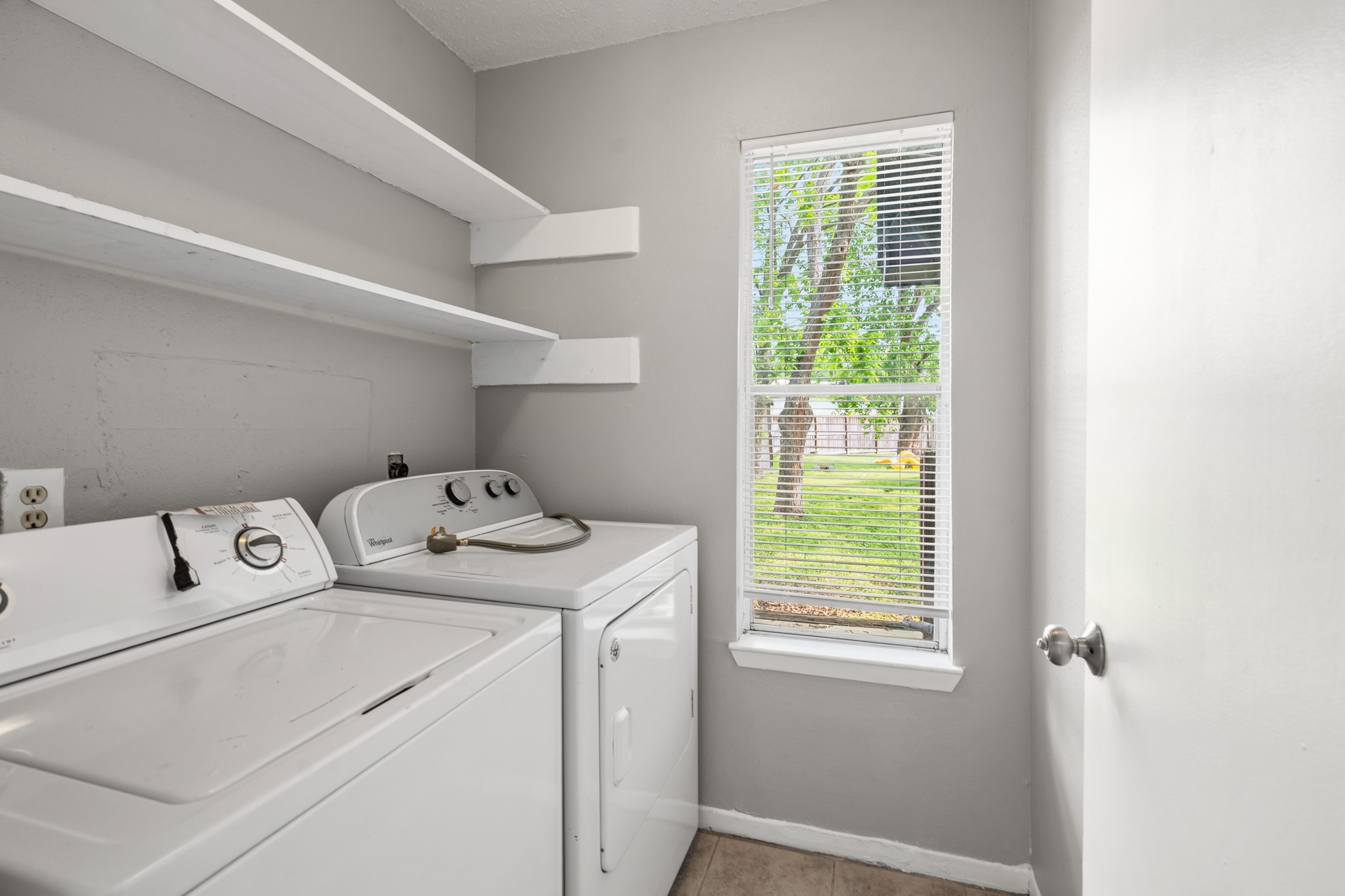 2220 Spruce Drive Rosenberg, TX 77471 - Photo 9 of 18 A separate utility room provides dedicated space for laundry and household tasks.