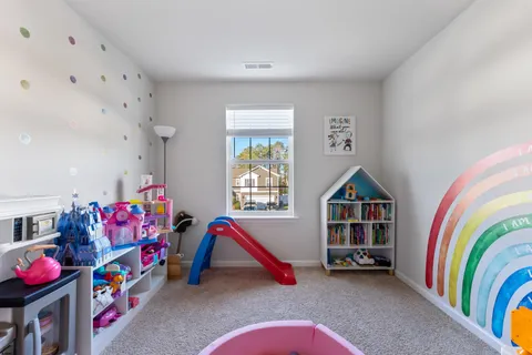 a view of an empty room with toys and toys
