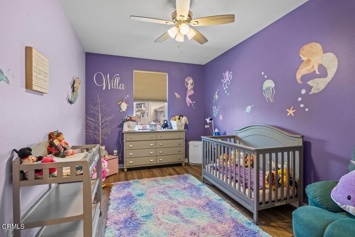 3004 Moonlight Park Avenue Oxnard, CA 93036 - Photo 11 of 28 a bedroom with furniture and a window