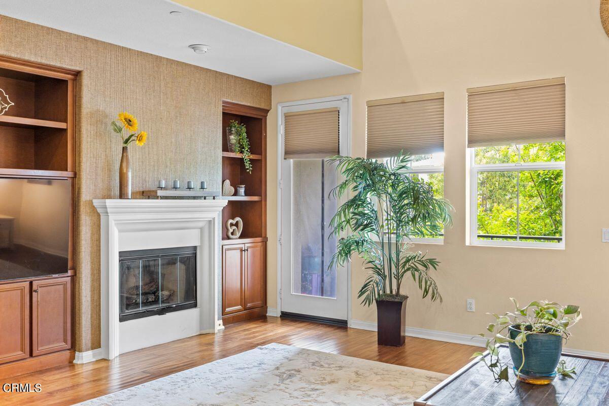 3004 Moonlight Park Avenue Oxnard, CA 93036 - Photo 21 of 28 a living room with furniture and a fireplace