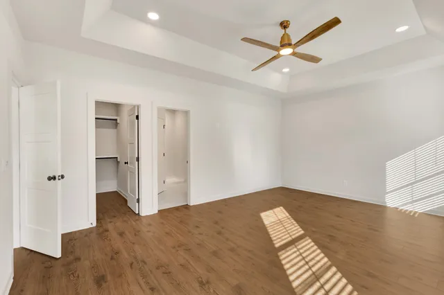 wooden floor in a hall with an entryway