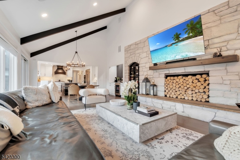 16 East Greenbrook Road North Caldwell, NJ 07006 - Photo 13 of 45 a living room with furniture and wooden floor