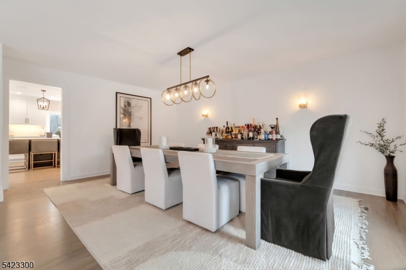 16 East Greenbrook Road North Caldwell, NJ 07006 - Photo 17 of 45 a view of kitchen with dining area refrigerator and window