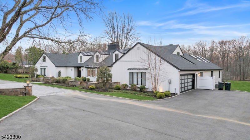 16 East Greenbrook Road North Caldwell, NJ 07006 - Photo 2 of 45 a view of a house with a big yard and large tree