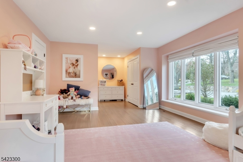 16 East Greenbrook Road North Caldwell, NJ 07006 - Photo 35 of 45 a living room with furniture and a large window