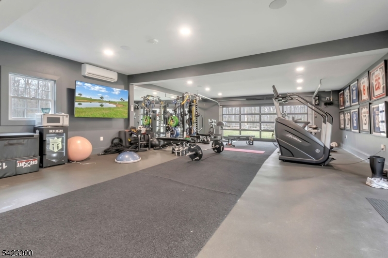 16 East Greenbrook Road North Caldwell, NJ 07006 - Photo 38 of 45 a view of a room with gym equipment