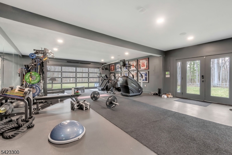 16 East Greenbrook Road North Caldwell, NJ 07006 - Photo 39 of 45 a view of a room with gym equipment