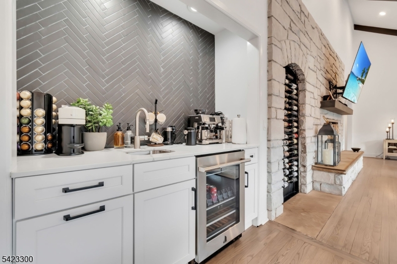 16 East Greenbrook Road North Caldwell, NJ 07006 - Photo 10 of 45 a bathroom with a sink and a mirror