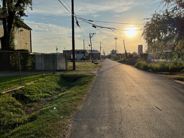 1611 Sylvester Road Houston, TX 77009 - Photo 12 of 12 a view of a road with a yard