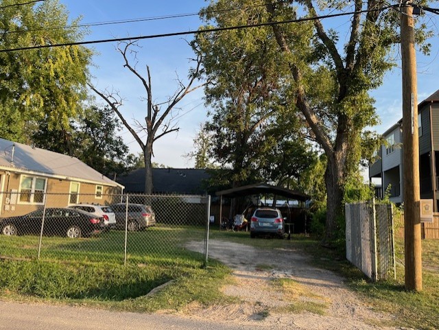 1611 Sylvester Road Houston, TX 77009 - Photo 5 of 12 a view of a yard in front of a house