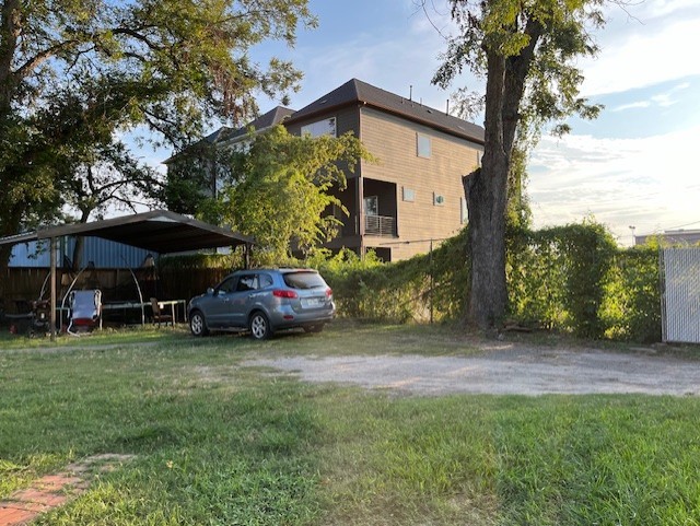 1611 Sylvester Road Houston, TX 77009 - Photo 7 of 12 a view of a house with a back yard