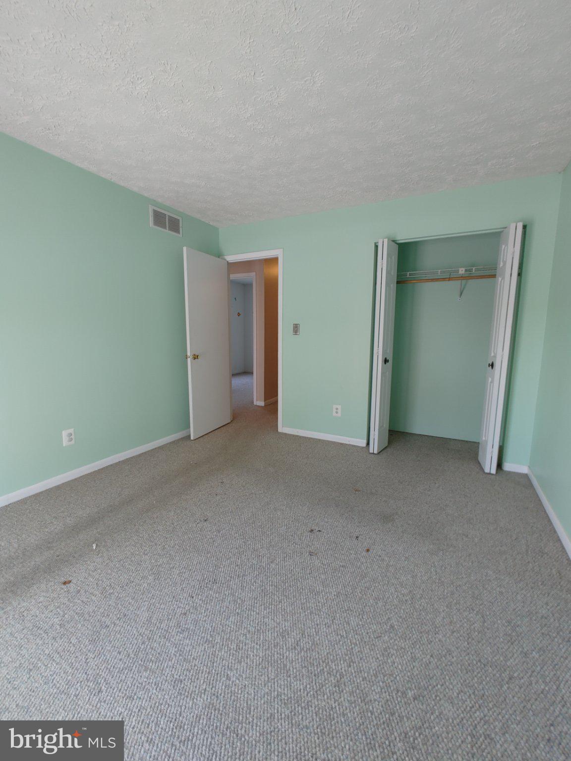 204 Granada Road Pasadena, MD 21122 - Photo 12 of 24 Serene mint green bedroom retreat.