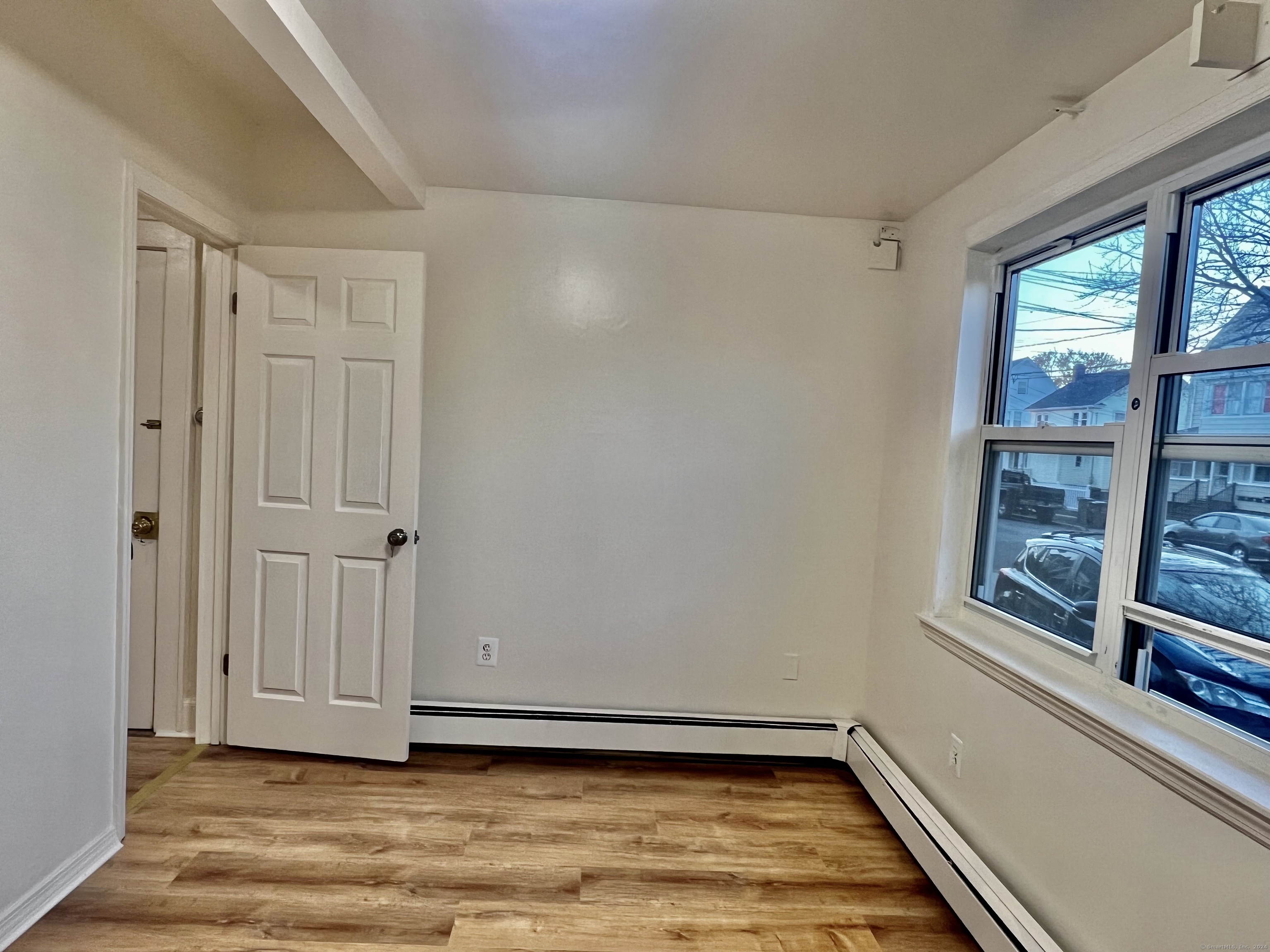 38 Wilson Street Stamford, CT 06902 - Photo 23 of 30 a view of an empty room with a window