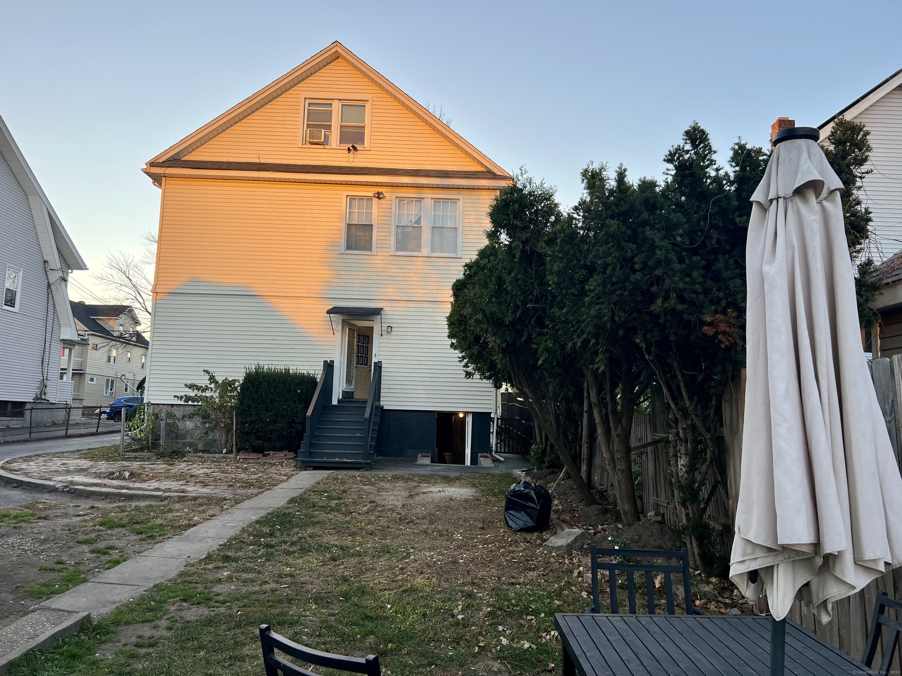 38 Wilson Street Stamford, CT 06902 - Photo 29 of 30 a front view of a house with a yard
