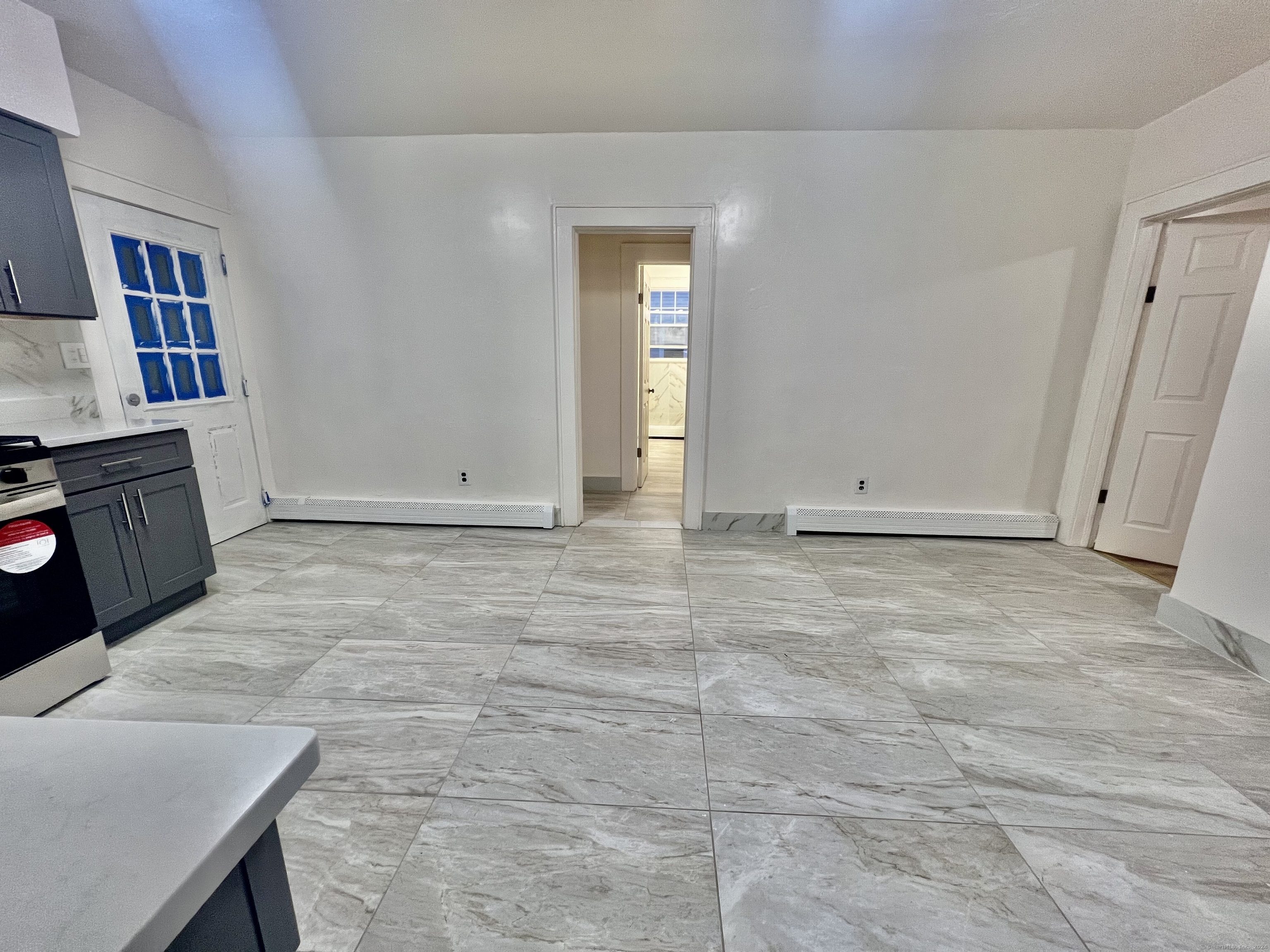 38 Wilson Street Stamford, CT 06902 - Photo 6 of 30 a view of an empty room and window