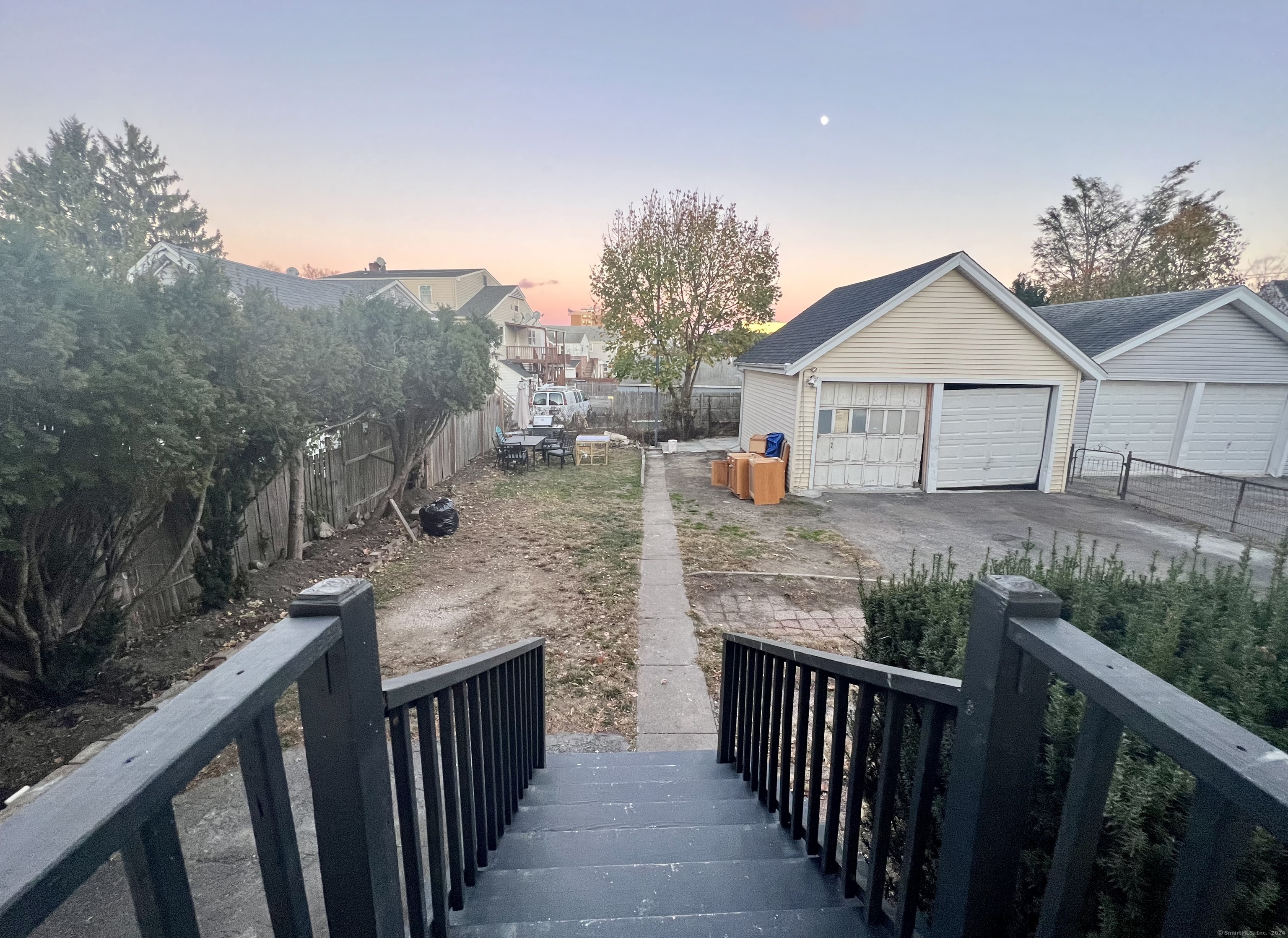 38 Wilson Street Stamford, CT 06902 - Photo 9 of 30 a view of a house with backyard and trees