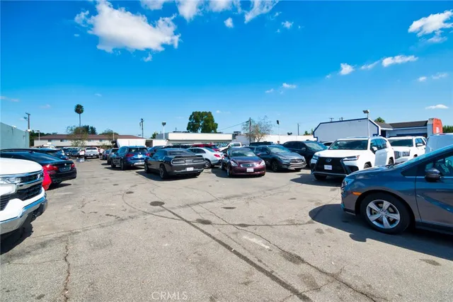 a view of cars parked in a parking lot