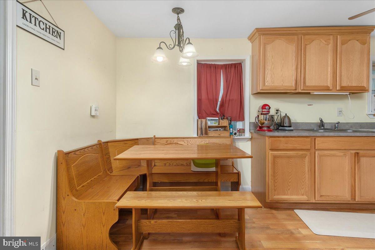 4402 Main Street Rohrersville, MD 21779 - Photo 11 of 31 Cozy kitchen nook with warm wood accents.