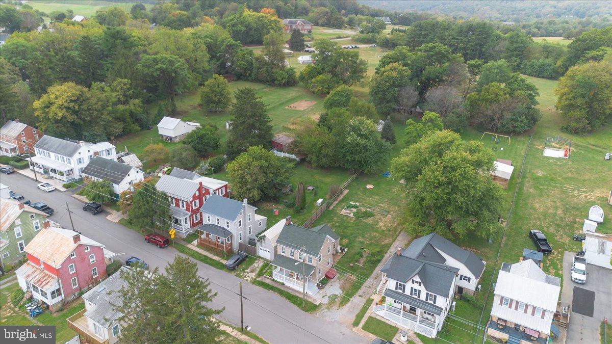 4402 Main Street Rohrersville, MD 21779 - Photo 27 of 31 Charming neighborhood nestled in lush greenery.