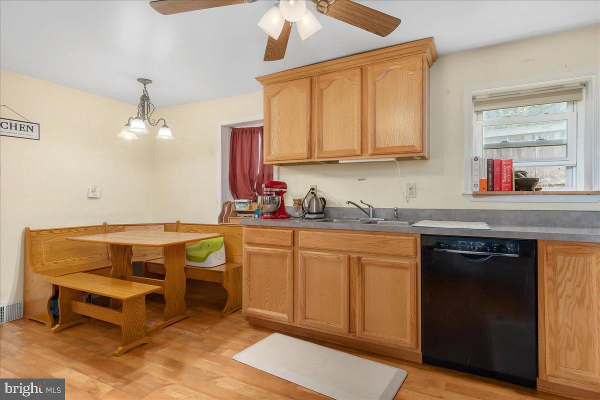 4402 Main Street Rohrersville, MD 21779 - Photo 10 of 31 Cozy kitchen with warm wooden accents.