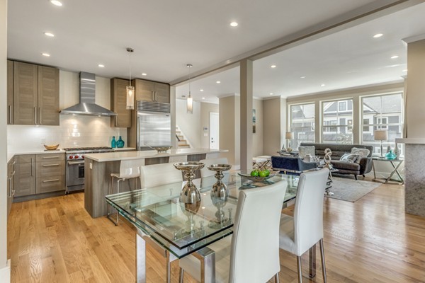 373 Langley Road, Unit 2 Newton, MA 02459 - Photo 6 of 21 a kitchen with counter top space a sink appliances and living room view