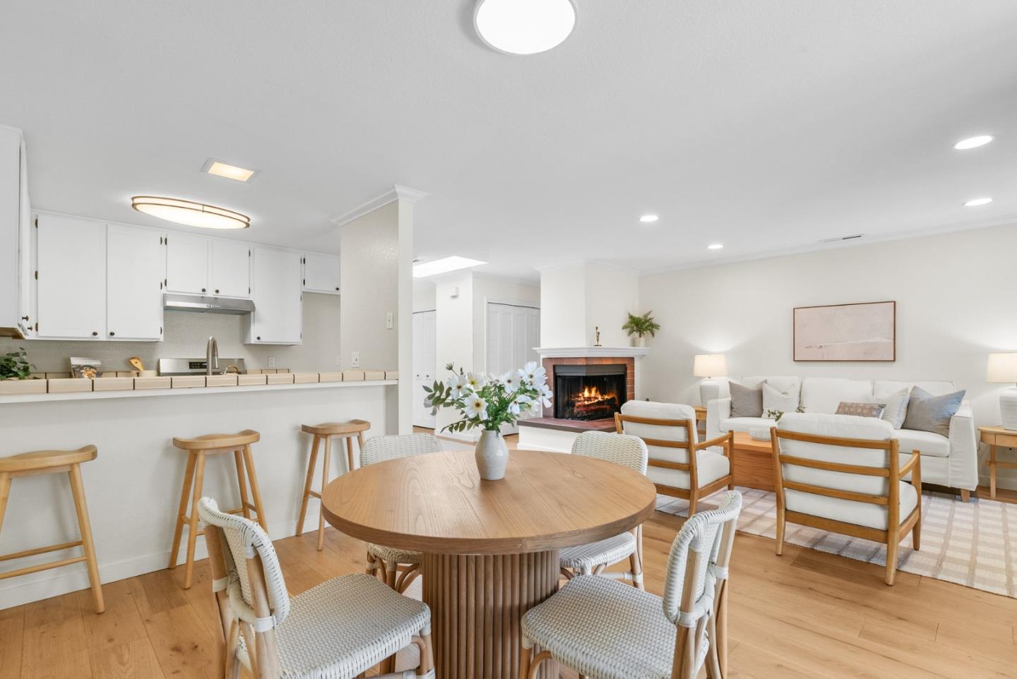 6101 Sheraton Place Aptos, CA 95003 - Photo 15 of 47 a kitchen with a table chairs stove and microwave