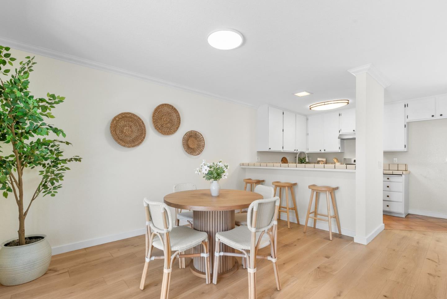 6101 Sheraton Place Aptos, CA 95003 - Photo 17 of 47 a kitchen with a table and chairs in it