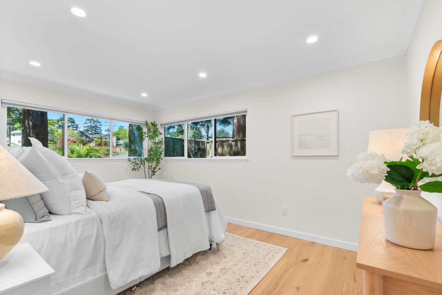 6101 Sheraton Place Aptos, CA 95003 - Photo 25 of 47 a bedroom with a large bed and a potted plant