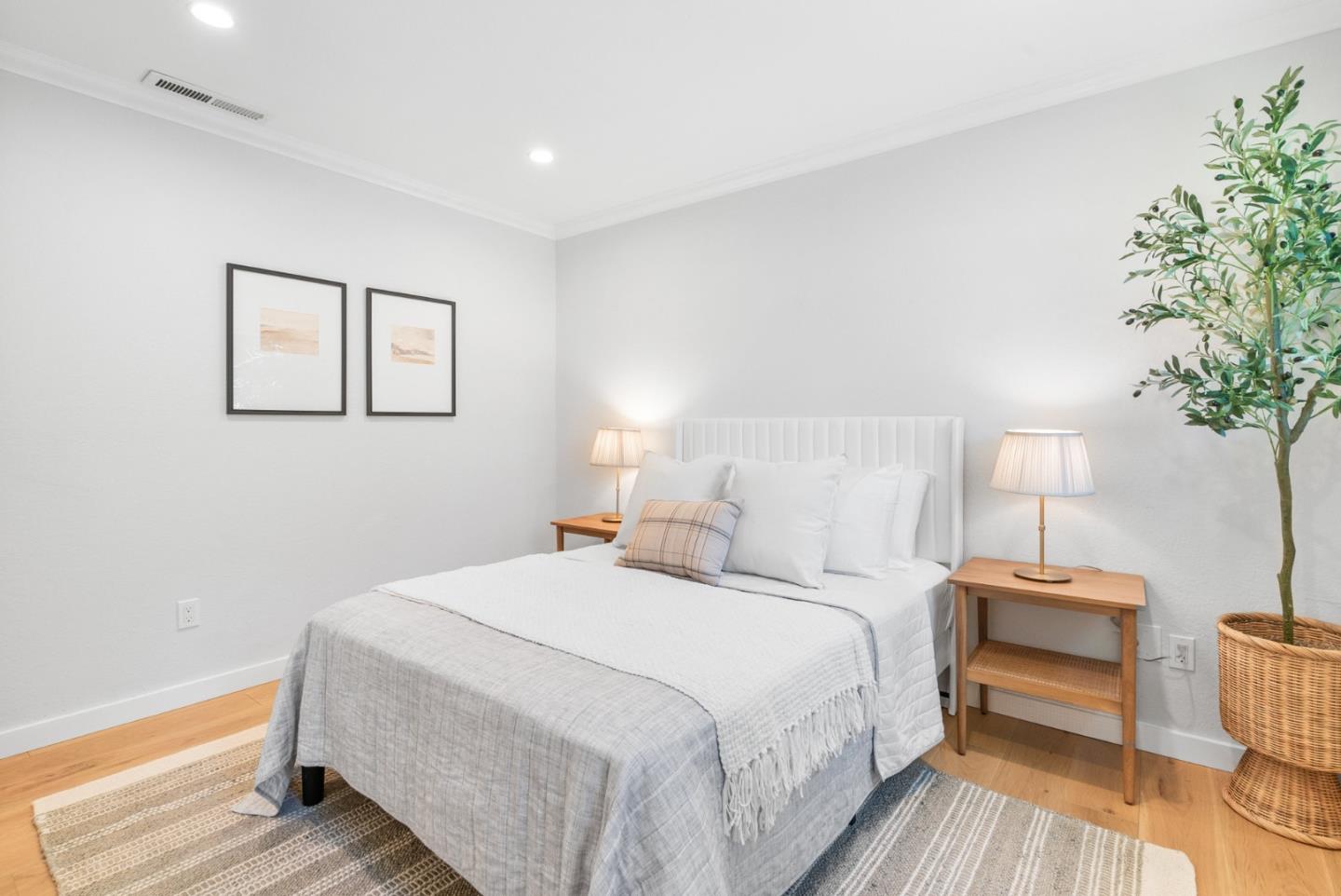 6101 Sheraton Place Aptos, CA 95003 - Photo 34 of 47 a bedroom with a bed and a potted plant