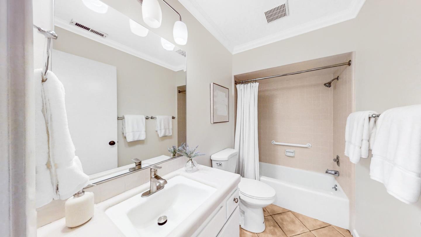 6101 Sheraton Place Aptos, CA 95003 - Photo 35 of 47 a bathroom with a sink a toilet and shower