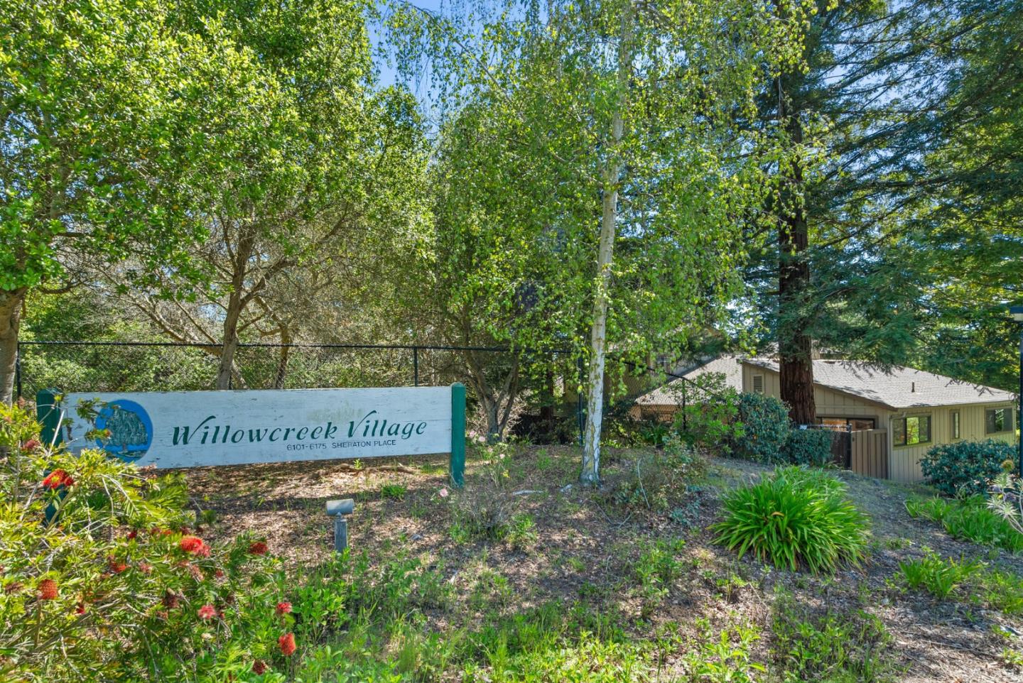 6101 Sheraton Place Aptos, CA 95003 - Photo 42 of 47 a sign on the side of the tree