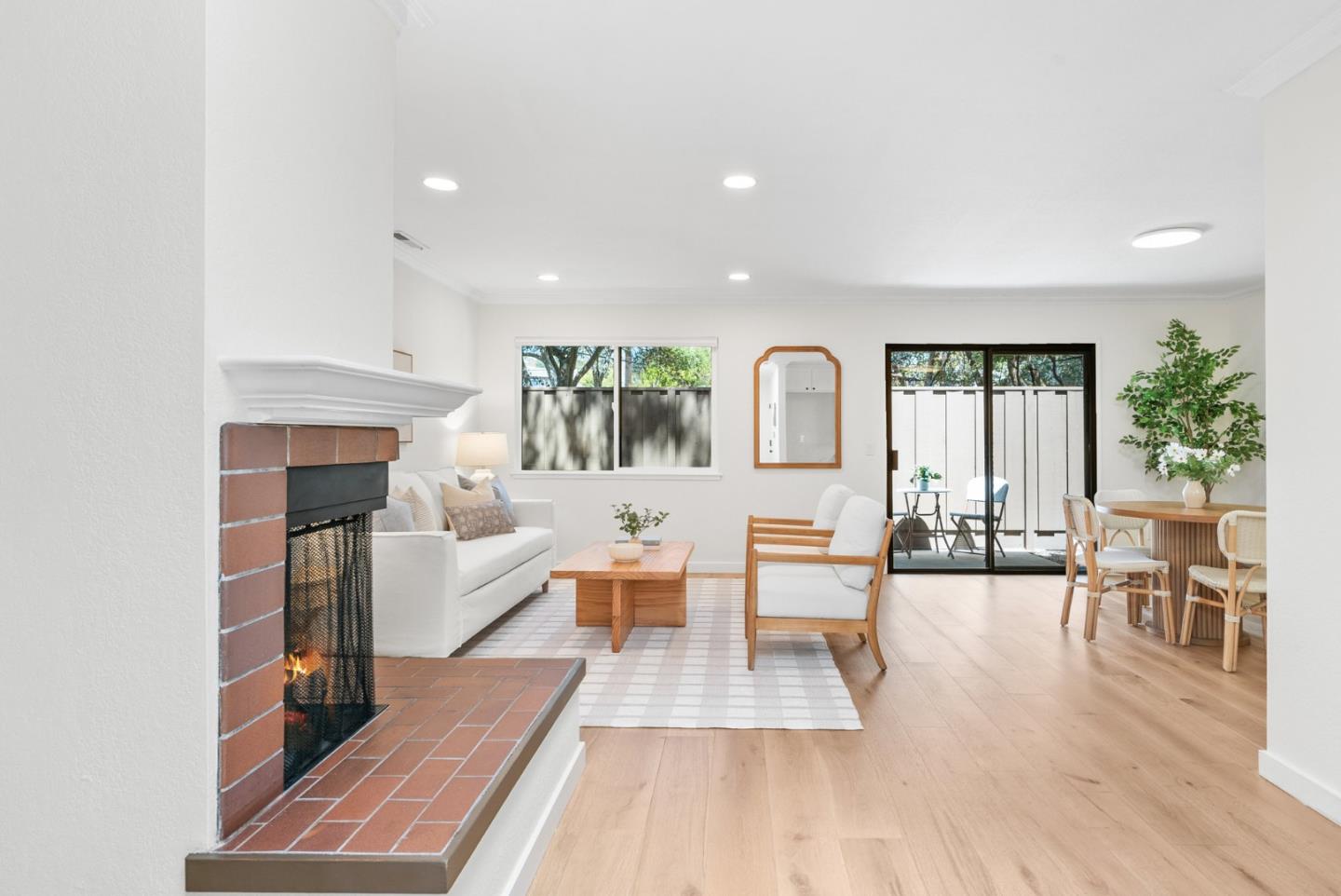 6101 Sheraton Place Aptos, CA 95003 - Photo 5 of 47 a living room with fireplace furniture and a wooden floor