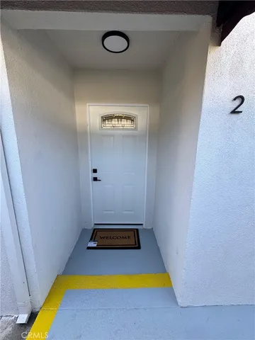 a room with pool and wooden floor