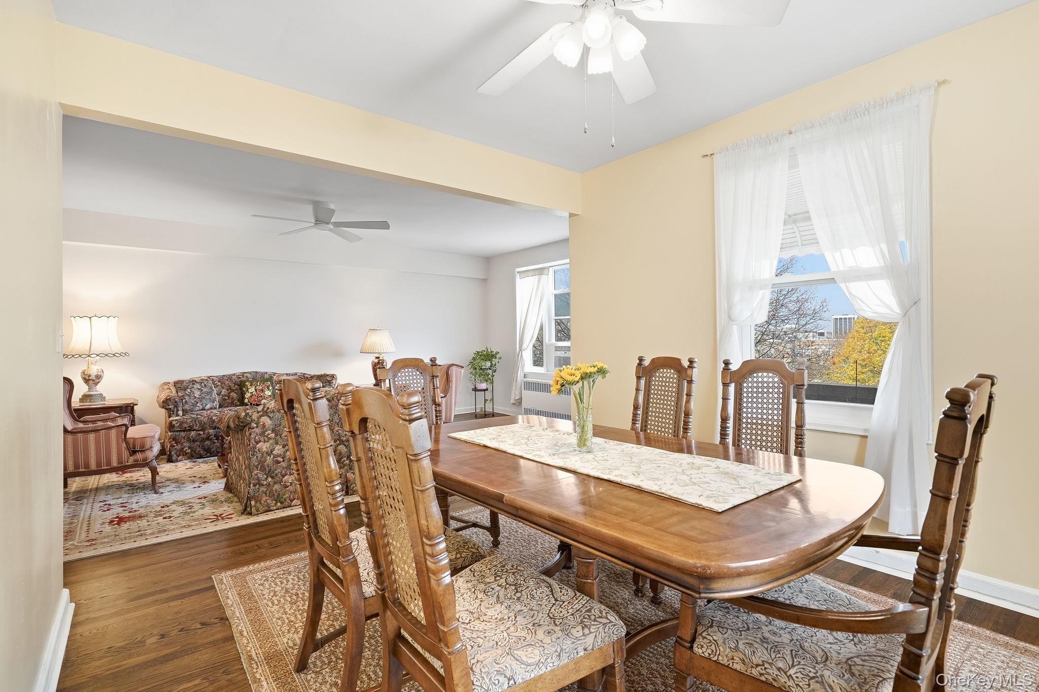 2 Overlook Road, Unit 3C3 White Plains, NY 10605 - Photo 16 of 36 a view of a dining room with furniture and wooden floor